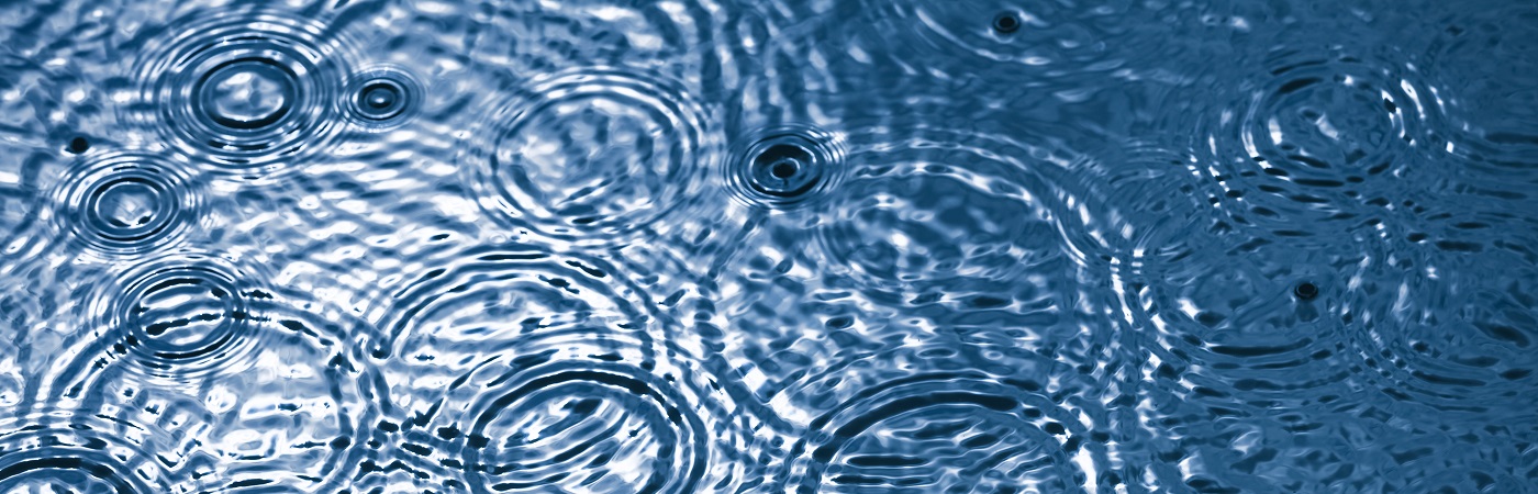 Liquidity - rain drops on water